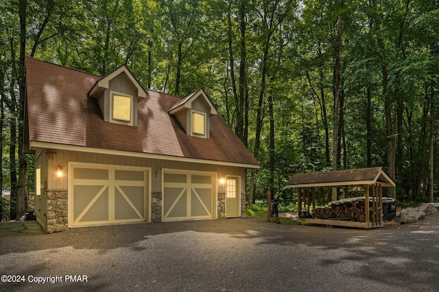 garage featuring a carport