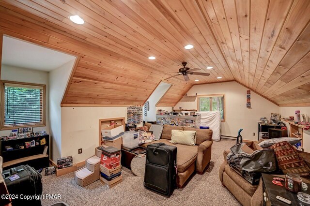 additional living space with vaulted ceiling, plenty of natural light, light colored carpet, and wooden ceiling