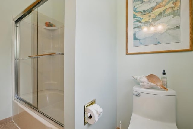 5153 Cresco Dr, Pocono Lake, PA 18347 - full bathroom featuring toilet, enclosed tub / shower combo, tile patterned flooring, and baseboards
