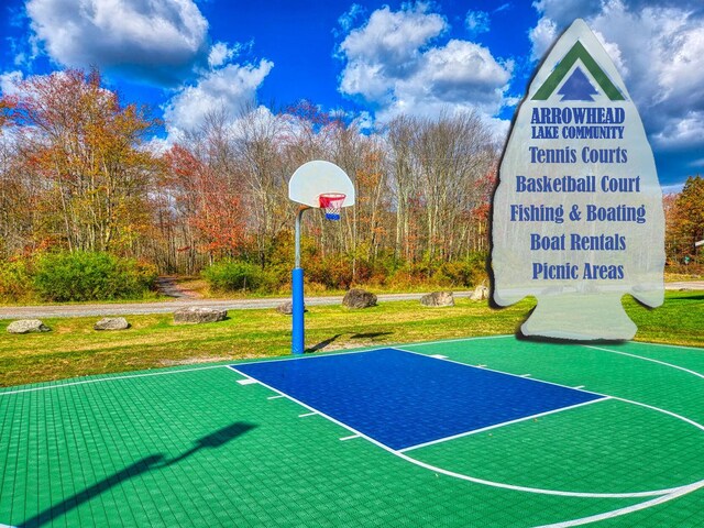 5153 Cresco Dr, Pocono Lake, PA 18347 - view of sport court with a lawn and community basketball court