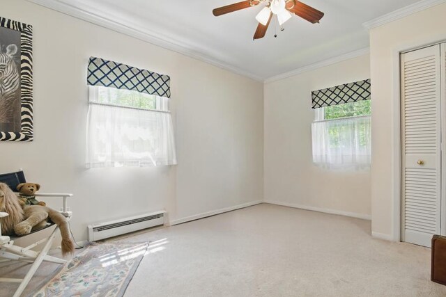 5153 Cresco Dr, Pocono Lake, PA 18347 - unfurnished bedroom featuring baseboard heating, ornamental molding, carpet floors, baseboards, and ceiling fan