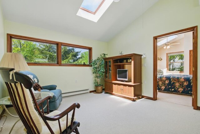 5153 Cresco Dr, Pocono Lake, PA 18347 - sitting room with baseboard heating, carpet flooring, a skylight, high vaulted ceiling, and a ceiling fan