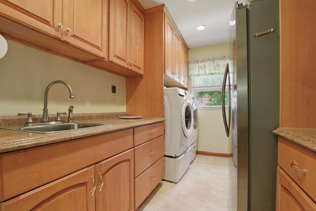 5153 Cresco Dr, Pocono Lake, PA 18347 - laundry area with washing machine and clothes dryer, baseboards, cabinet space, recessed lighting, and light flooring