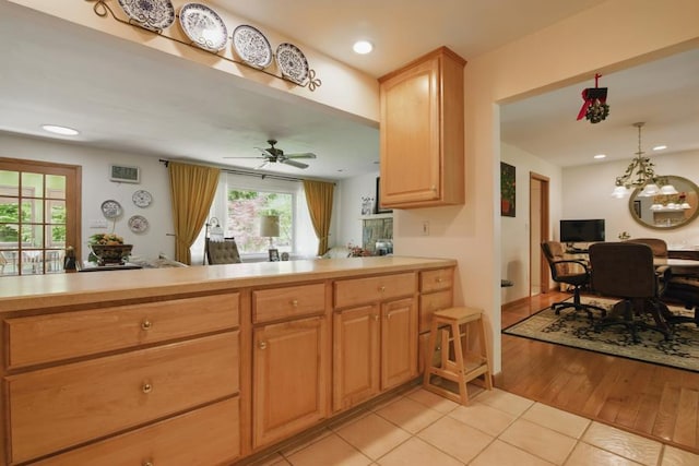 5153 Cresco Dr, Pocono Lake, PA 18347 - kitchen with light tile patterned floors, light countertops, recessed lighting, and a ceiling fan