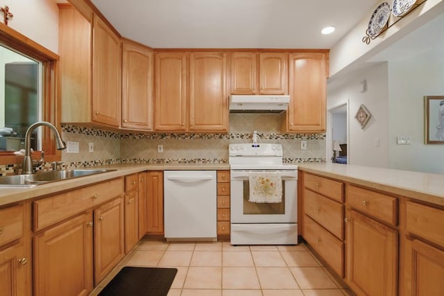 5153 Cresco Dr, Pocono Lake, PA 18347 - kitchen with white appliances, under cabinet range hood, a sink, backsplash, and recessed lighting
