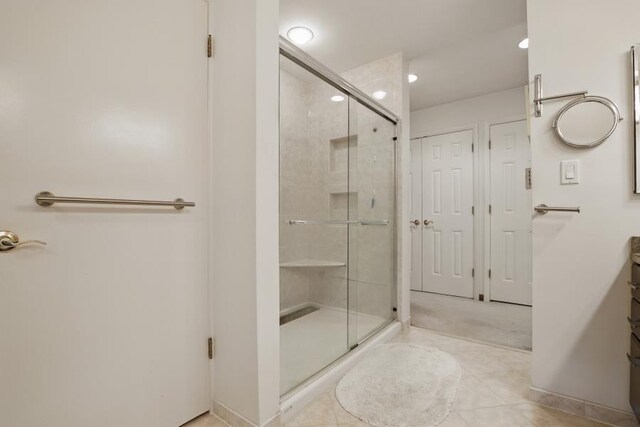 5153 Cresco Dr, Pocono Lake, PA 18347 - bathroom with a stall shower, recessed lighting, vanity, and tile patterned floors