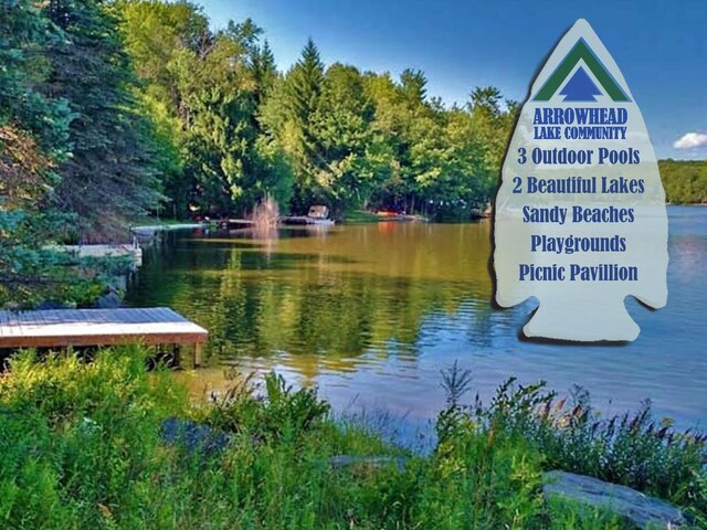 5153 Cresco Dr, Pocono Lake, PA 18347 - water view with a heavily wooded area