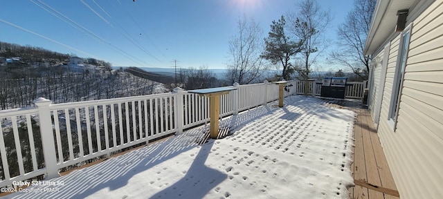 view of snow covered deck