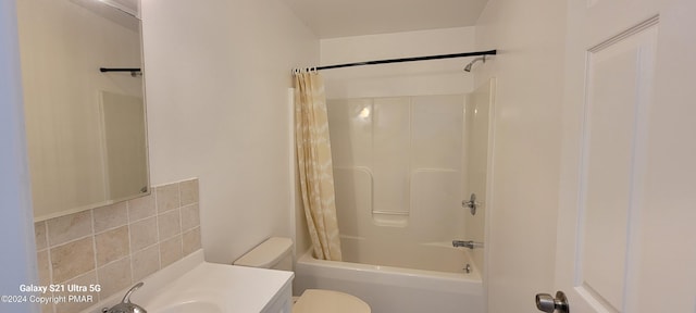 full bathroom featuring shower / tub combo, vanity, and toilet