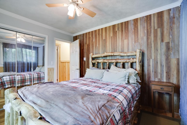 354 Fawn Rd, Pocono Lake, PA 18347 - bedroom featuring wooden walls, crown molding, and ceiling fan
