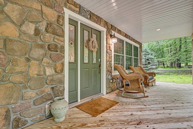 141 Beech Ln, Pocono Lake, PA 18347 - entrance to property featuring stone siding and covered porch