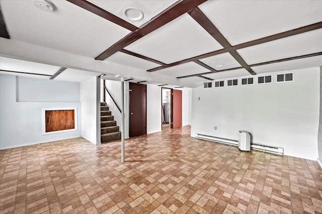 6061 Decker Rd, Bushkill, PA 18324 - unfurnished living room with brick patterned floors, a baseboard heating unit, baseboards, coffered ceiling, and beam ceiling