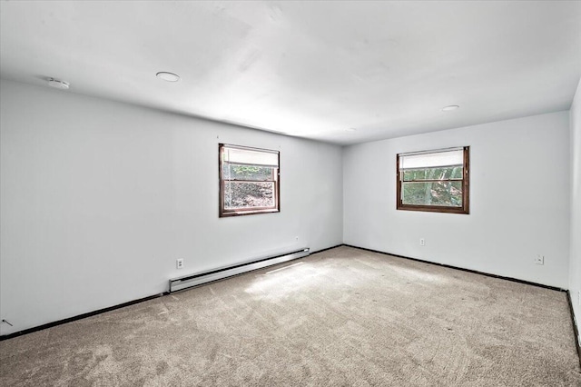 6061 Decker Rd, Bushkill, PA 18324 - unfurnished room featuring a baseboard heating unit, carpet, a smoke detector, and baseboards