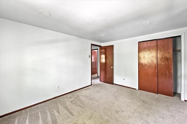 6061 Decker Rd, Bushkill, PA 18324 - unfurnished bedroom featuring carpet floors, a closet, and baseboards