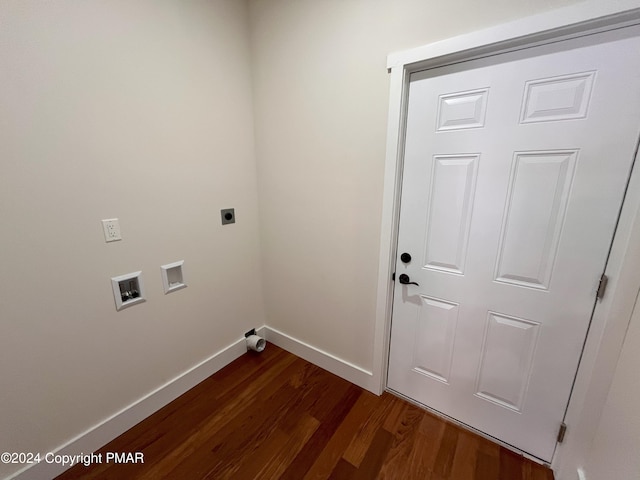 clothes washing area featuring hookup for a washing machine, hookup for an electric dryer, laundry area, dark wood-type flooring, and baseboards