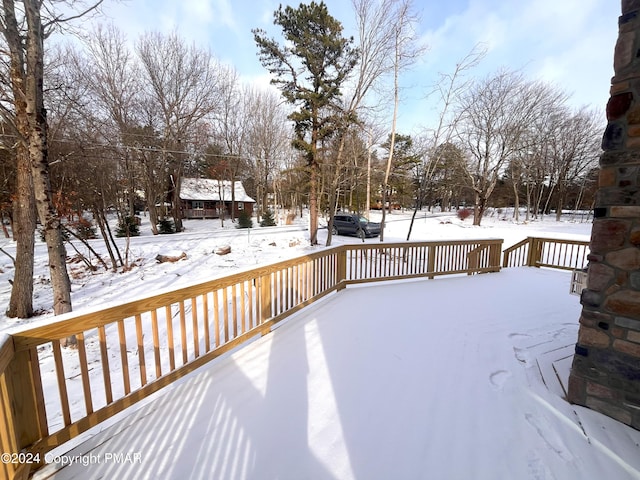 view of snow covered deck