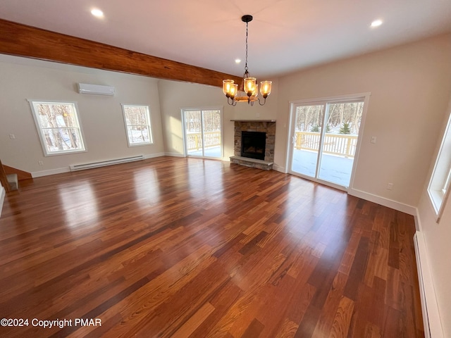 unfurnished living room featuring baseboard heating, wood finished floors, beam ceiling, and a notable chandelier