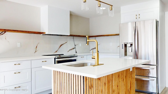 182 Mallard Ln, Albrightsville, PA 18210 - kitchen featuring appliances with stainless steel finishes, light countertops, white cabinetry, and a sink