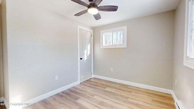 182 Mallard Ln, Albrightsville, PA 18210 - unfurnished room featuring light wood-style floors, baseboard heating, ceiling fan, and baseboards
