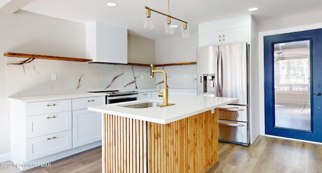182 Mallard Ln, Albrightsville, PA 18210 - kitchen featuring stainless steel appliances, tasteful backsplash, light countertops, light wood-style flooring, and a sink