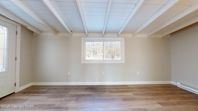 182 Mallard Ln, Albrightsville, PA 18210 - entryway featuring a baseboard heating unit, beamed ceiling, wood finished floors, and baseboards