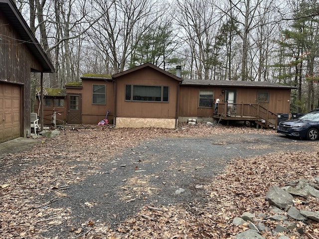 3175 Pocono Dr, East Stroudsburg, PA 18302 - view of front facade featuring aphalt driveway and crawl space