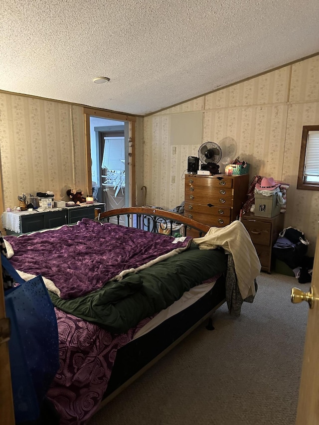 3175 Pocono Dr, East Stroudsburg, PA 18302 - bedroom featuring a textured ceiling, carpet flooring, and wallpapered walls