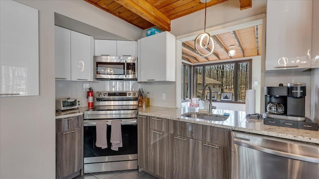 3206 Stonehenge Dr, East Stroudsburg, PA 18301 - kitchen with a sink, wood ceiling, appliances with stainless steel finishes, and beam ceiling