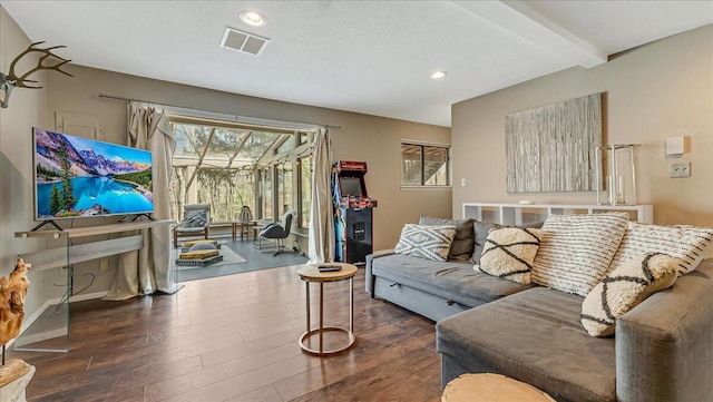 3206 Stonehenge Dr, East Stroudsburg, PA 18301 - living area with visible vents, wood finished floors, beam ceiling, baseboards, and recessed lighting