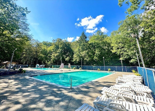 3206 Stonehenge Dr, East Stroudsburg, PA 18301 - pool with fence and a patio