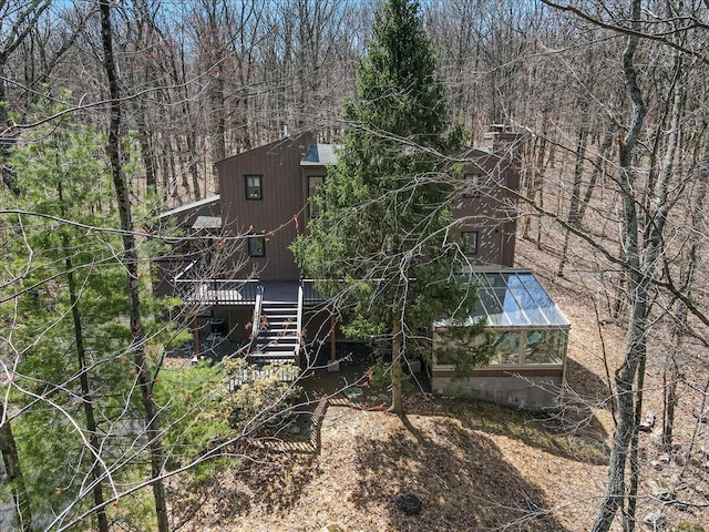 3206 Stonehenge Dr, East Stroudsburg, PA 18301 - rear view of property with a wooden deck, an outbuilding, stairs, and an exterior structure