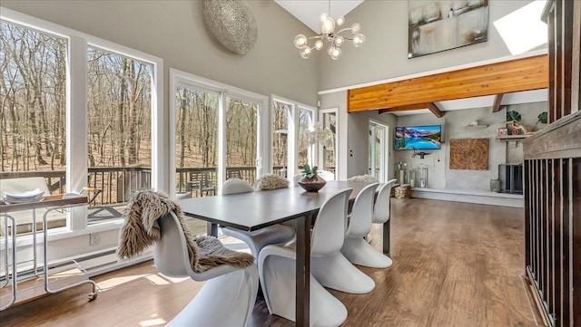 3206 Stonehenge Dr, East Stroudsburg, PA 18301 - sunroom / solarium featuring an inviting chandelier, high vaulted ceiling, wood finished floors, and beam ceiling