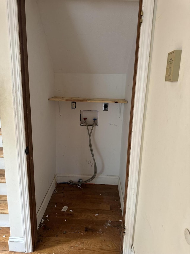 washroom featuring electric dryer hookup, washer hookup, hardwood / wood-style floors, and laundry area