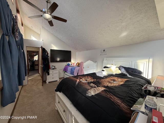 bedroom featuring a ceiling fan, vaulted ceiling, light colored carpet, and a textured ceiling