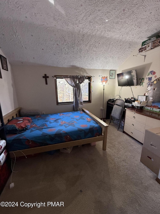 carpeted bedroom with lofted ceiling and a textured ceiling