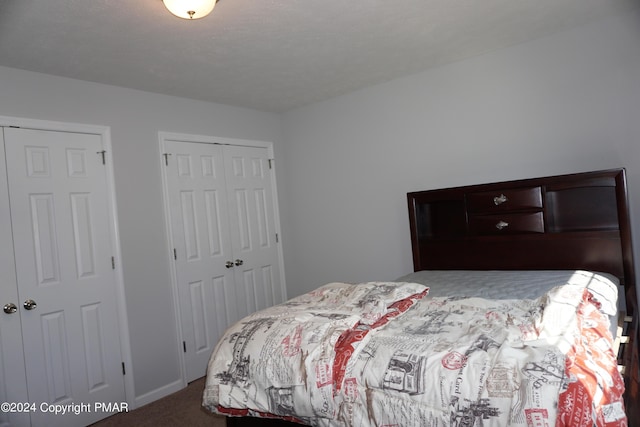 carpeted bedroom featuring a closet