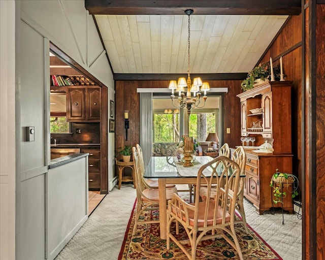 1125 Rhododendron Ln, Pocono Summit, PA 18346 - dining space with light carpet, wood walls, a chandelier, wooden ceiling, and lofted ceiling