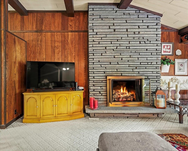 1125 Rhododendron Ln, Pocono Summit, PA 18346 - living room featuring wooden walls, carpet floors, and a fireplace