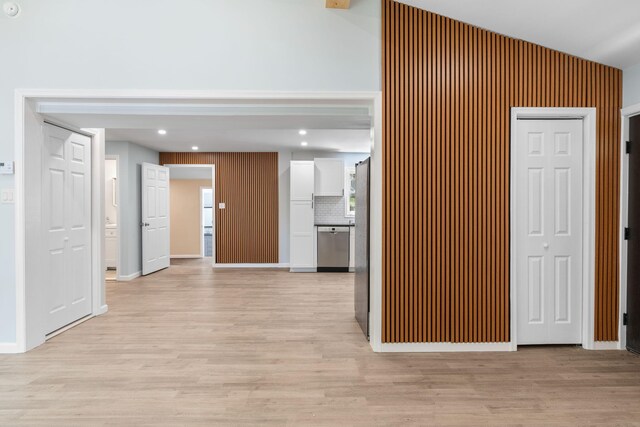 410 Sunset Forest Dr, Hawley, PA 18428 - hallway with light wood-type flooring, recessed lighting, lofted ceiling, and baseboards