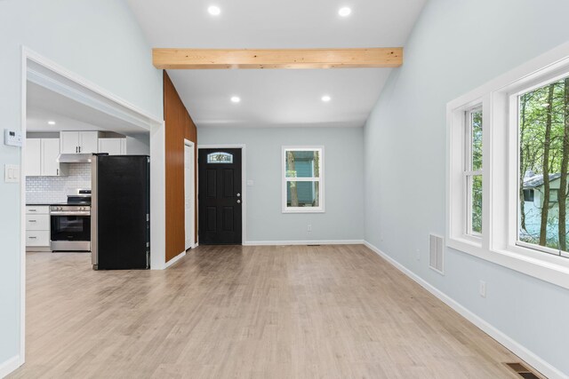 410 Sunset Forest Dr, Hawley, PA 18428 - unfurnished living room featuring beamed ceiling, light wood-type flooring, recessed lighting, and baseboards