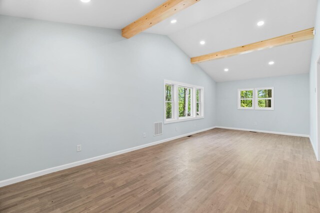 410 Sunset Forest Dr, Hawley, PA 18428 - spare room with beamed ceiling, recessed lighting, baseboards, wood finished floors, and high vaulted ceiling