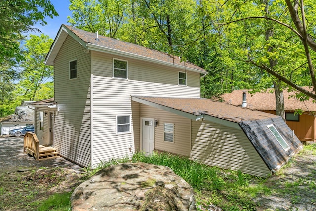 410 Sunset Forest Dr, Hawley, PA 18428 - rear view of house featuring a shingled roof