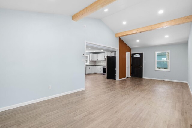 410 Sunset Forest Dr, Hawley, PA 18428 - unfurnished living room featuring beamed ceiling, recessed lighting, light wood-style floors, baseboards, and high vaulted ceiling