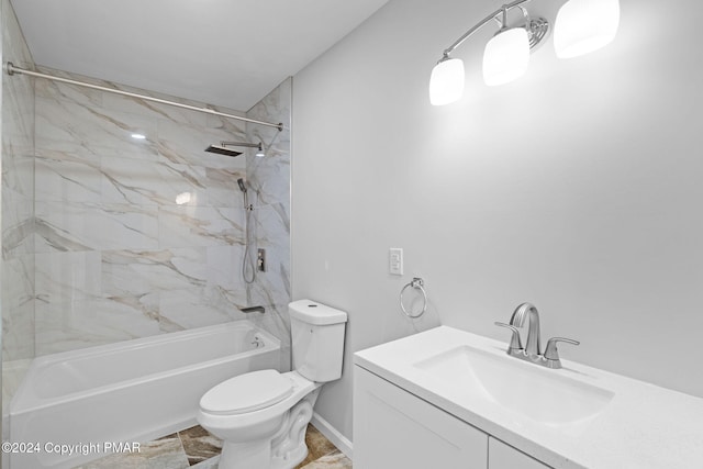 bathroom featuring toilet, shower / tub combination, baseboards, and vanity