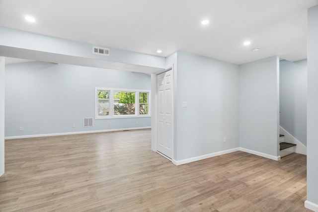 410 Sunset Forest Dr, Hawley, PA 18428 - below grade area featuring light wood-style flooring, recessed lighting, baseboards, and stairway