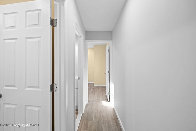 410 Sunset Forest Dr, Hawley, PA 18428 - hall featuring wood finished floors and baseboards