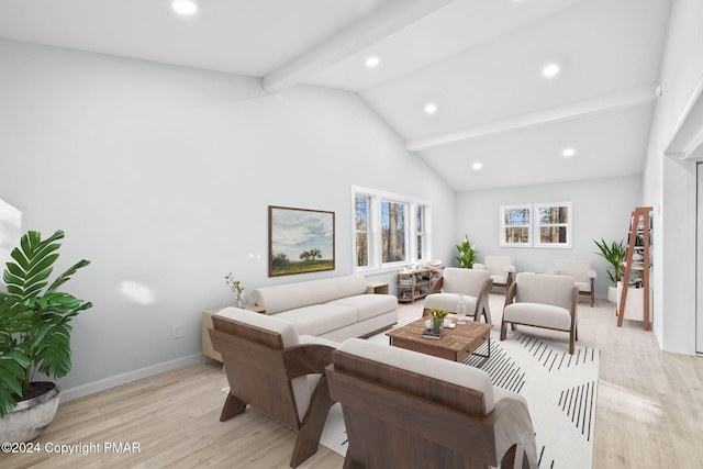 living area featuring light wood-style floors, baseboards, beamed ceiling, and recessed lighting