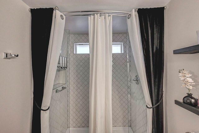 full bath with a shower stall