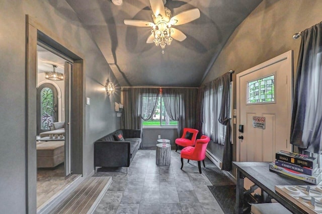 foyer entrance with lofted ceiling, ceiling fan, and a baseboard heating unit