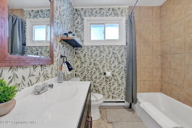 bathroom with toilet, a baseboard heating unit, vanity, shower / bath combination with curtain, and wallpapered walls